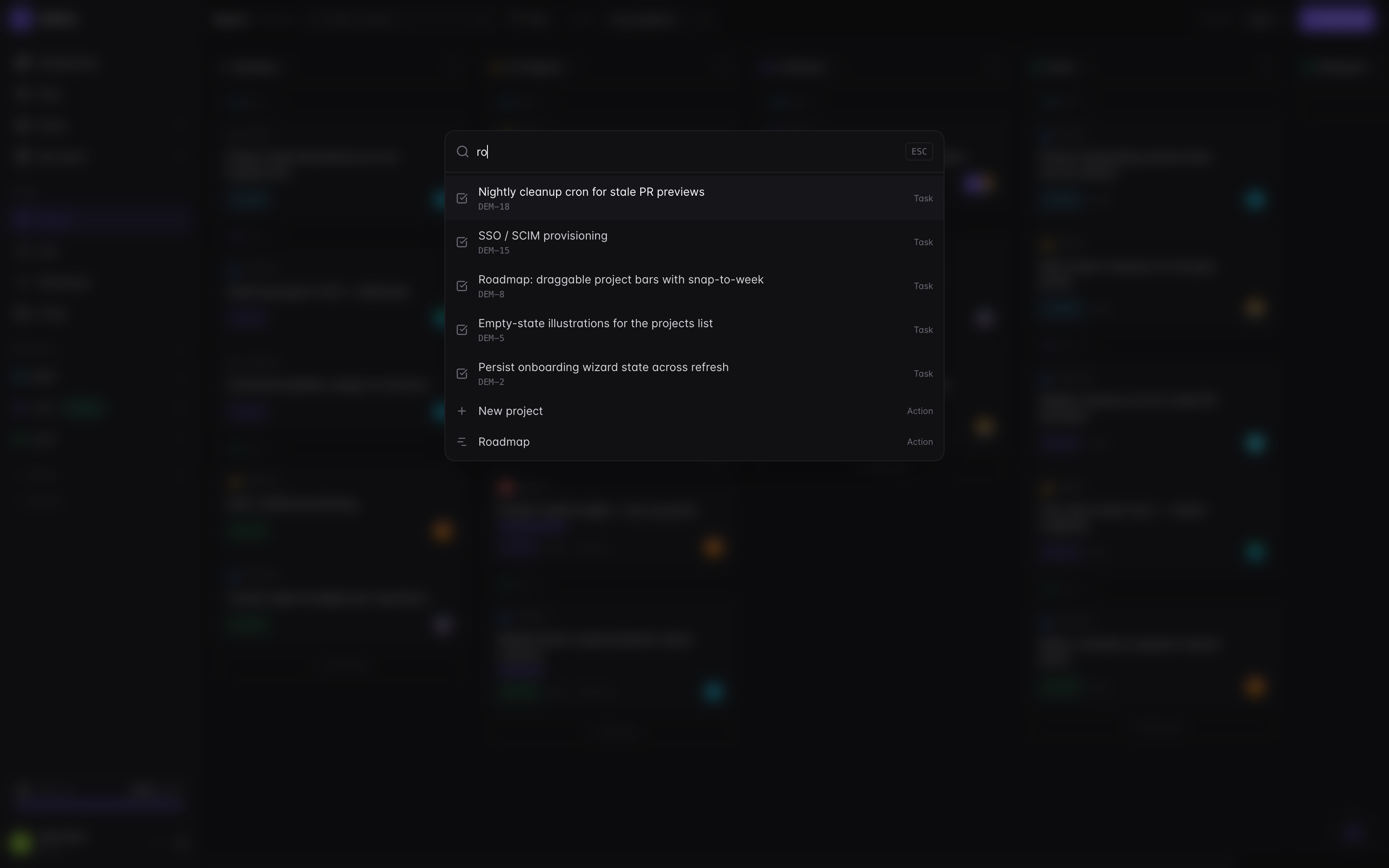 Command palette open over a dimmed workspace: a fuzzy query matching tasks by identifier, recent tasks listed above, quick actions at the bottom